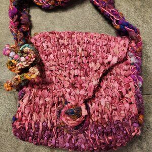 Handmade new, crocheted pink purse. 8x8 and handle 22in, button closure.